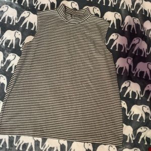 Long tank with mid turtle neck. Size L